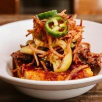 Wrb Grits & Brisket · Baked cheese grits topped with chopped brisket, pickled green tomatoes, jalapeños, crispy on...
