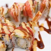Kodo Roll · 8 pieces. Shrimp tempura roll topped with crab, avocado, spicy mayo and eel sauce.