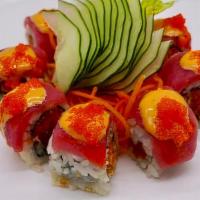 Nc State Roll · Eight  pieces. Raw. Spicy tuna roll topped with tuna, flying fish roe and spicy mayo.