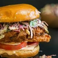 Jalapeno Fried Chicken Sandwich · Crispy, crunchy fried chicken sandwich. Served with spicy jalapeno, lettuce, tomatoes, and A...