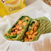 Chickpea Wrap · Chickpeas marinated in indian curry spices with hummus, spinach, shredded carrots, and tofu....