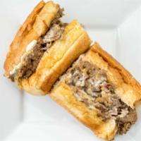 Philly Steak & Cheese Sub · Our famous real deal Philly Steak & Cheese, Our Cheese Steak is sliced from the ribeye rolls...