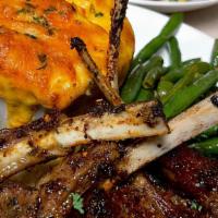 Full Rack Of Lamb · 8 cuts of lamb, served with 2 sides and a roll