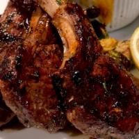 ½ Rack Of Lamb · 4 cuts of lamb, served with 2 sides and a roll