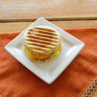 English Breakfast Muffin · Ham, egg, and cheddar on a toasted English muffin.