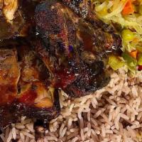 Jerk Chicken · Smoked and authentic flavored to the bone Jamaican Style Jerk Chicken.  Served with your cho...