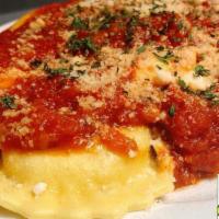 Ravioli · Choice of cheese or beef ravioli pasta stuffed with ricotta, Parmesan, and mozzarella. Toppe...
