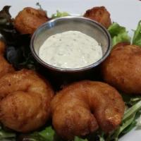 Shrimp Puppies · A quarter-pound of hush puppy battered shrimp with a side of our house reoulade.