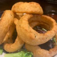 Onion Rings · Battered onion rings served with a chipotle dipping sauce.