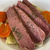 Corned Beef & Cabbage · An Irish tradition! Corned in-house, hand sliced and laid over cabbage, potatoes and carrots...