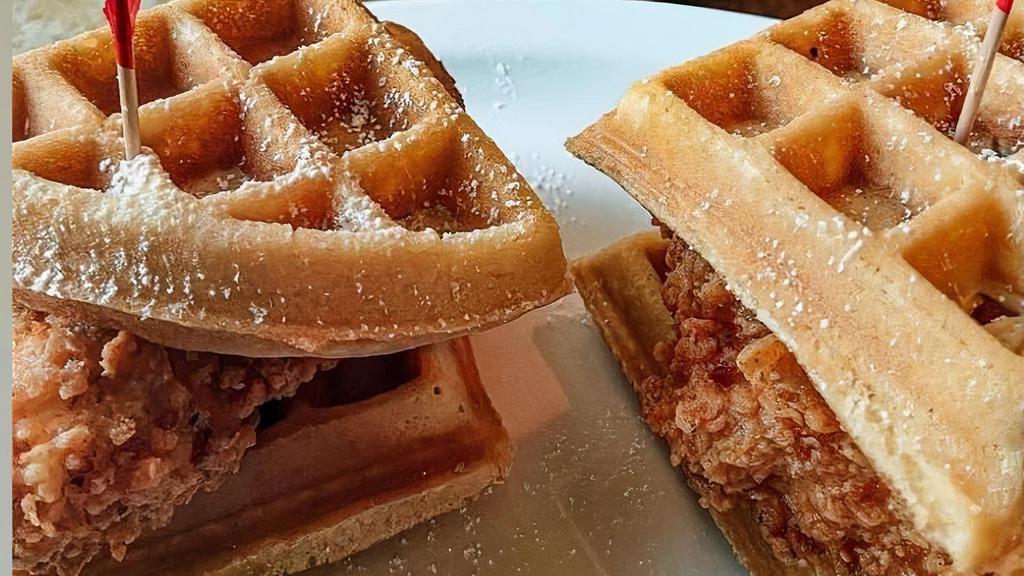 Chicken & Waffle · Crispy chicken breast between Belgian waffles with maple syrup on the side.