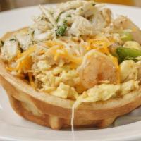 Breakfast Waffle Bowl · Waffle bowl filled with scrambled eggs, onions, bell peppers, and your choice of bacon sausa...