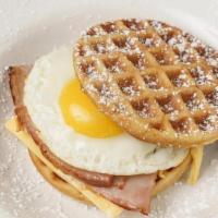 Breakfast Wafflewich · Belgian waffle sandwich with choice of bacon, sausage, ham, turkey or no meat. Topped with e...