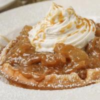 Caramel Apple Waffle · Belgian waffle topped with warm apples, graham cracker crumbs  and whipped cream, drizzled i...