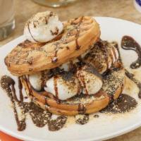 Campfire Waffle · Graham cracker wafflewich with toasted marshmallows and drizzled in chocolate.