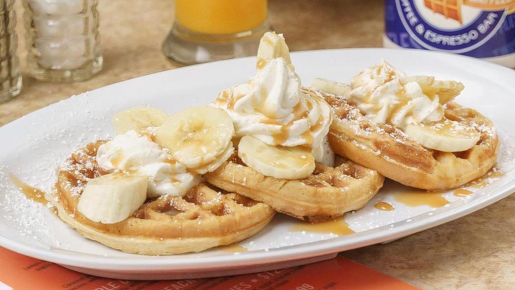 Crazy Bananas Waffle · Belgian waffle topped with confectioners’ sugar and bananas, drizzled in caramel.