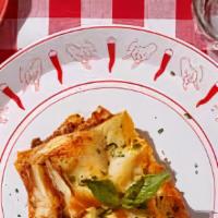 Lasagna Classico · Beef, tomato, mozzarella over layers of tender pasta, topped with marinara sauce and baked w...