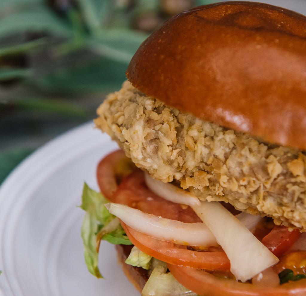 Vegan Fried Chick'N Sandwich (Sandwich Only) · Vegan. Served with lettuce, tomato, onion, and sauce.