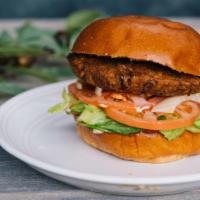 Black Bean Burger (Sandwich Only) · Vegan. Served with lettuce, tomato, onion, and sauce.