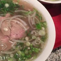 Pho Tai · Sliced eye round beef. Vietnamese authentic rice noodle soup. Served with bean sprouts, basi...