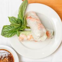 Goi Cuon · Two soft spring rolls, shrimp, pork, and lettuce wrapped in a rice paper.