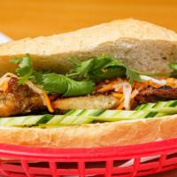 Banh Mi Ga Nuong · Grilled chicken sandwich. Stuffed with pickled carrots, cucumber, and cilantro.