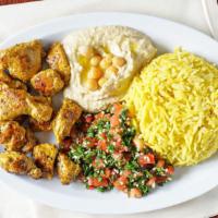 Shish Tawook Platter · cubed marinated chicken breasts, hummus, rice and salad.