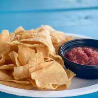 Chips And Salsa · Large portion of crispy corn tortillas with a side of salsa.