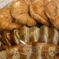 Assorted Breakfast Pastries (Serves 12) · Includes assorted scones, coffee cake and sweet bread loaves. Serves 12 people Please allow ...