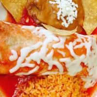 Burrito California · filled with steak, fries, and cheese. Covered with cheese and red sauce. Served with rice an...