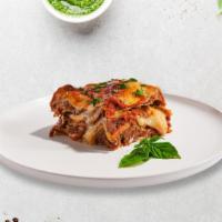 Lasagna · Layers of pasta, sauce, and cheese topped with fresh pecorino romano and baked to perfection.