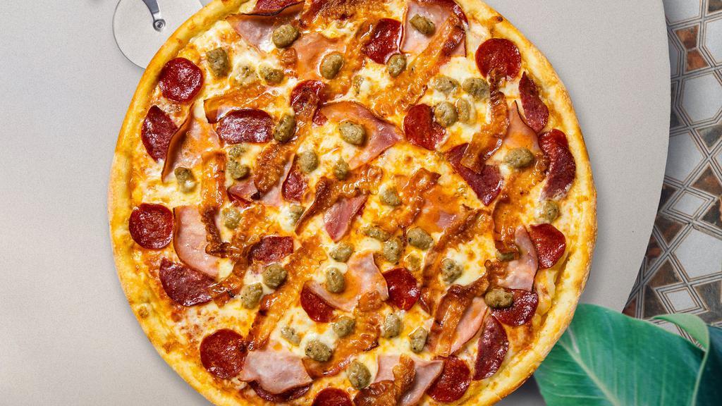 Meat Lovers Pizza · Take your pick of our famous house made or gluten-free dough topped with red sauce, pepperoni, salami, canadian bacon, and our house cheese blend