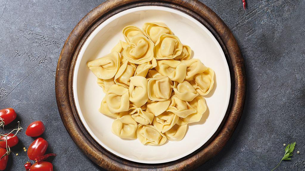 Custom Tortellini  · Tortellini cooked al dente with your choice of protein, toppings and homemade sauce.
