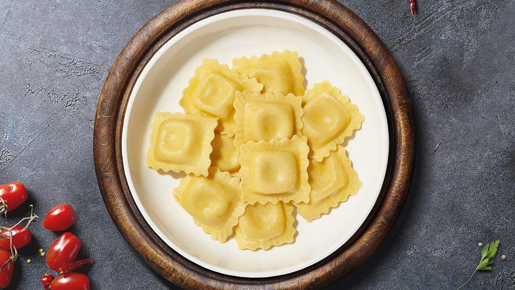 Custom Ravioli  · Fresh cheese ravioli cooked with your choice of protein, toppings and homemade sauce.