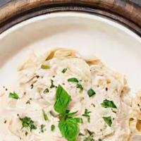 Don'T Be Alfredo  · Fettuccine pasta cooked in creamy white sauce and aged parmesan.