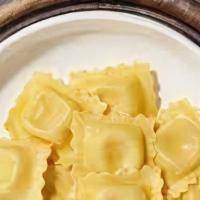 Da Vinci'S Tortellini  · Tortellini pasta cooked al dente tossed in creamy white sauce topped aged parmesan.