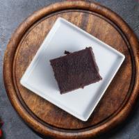 Chocolate Indulgence Torte  · Rich round chocolate ganache fudge cake.
