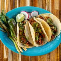 Tacos - Mix & Match · 3 pieces. Mix & Match. Tacos are served on hand made corn tortilla topped with cilantro & on...