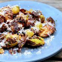 Crispy Brussels Sprouts · Balsamic apples, mustard seed, pecorino