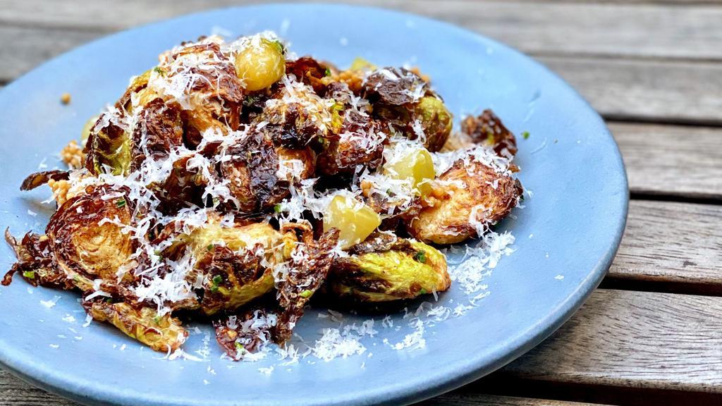 Crispy Brussels Sprouts · Balsamic apples, mustard seed, pecorino