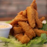 Calamari · Hand breaded fresh to order and served with tomato aioli.