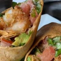 Cajun Shrimp Wrap · Hand breaded Cajun fried shrimp, lettuce, tomato and avocado rolled in a chipotle wrap serve...