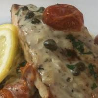 Grilled Salmon Pasta · Grilled salmon filet, capers, fire roasted tomatoes on angel hair with lemon infused cream s...