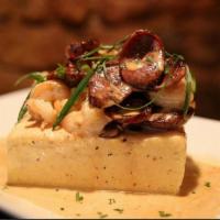 Shrimp & Grits · Cheddar and asiago grits, sautéed shrimp, pan seared Cajun sausage, scallions with a spicy c...