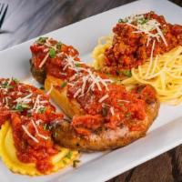 House Combination · Meat sauce spaghetti , Manicotti, ravioli, Italian sausage and meatball served with tomato s...