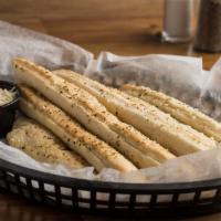Bread Sticks · Our breadsticks are unique to the pizza shack because we make our own dough and use that dou...