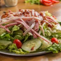 Chef Salad · For those who want it all. We begin with a mix of romaine and iceberg lettuce. Then we add c...