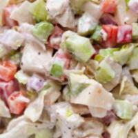 Chicken Salad · Iceberg lettuce is piled high with our homemade chicken salad, then it's topped with applewo...