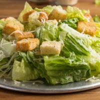 Caesar Salad · Our take on a classic. Romaine lettuce tossed with Parmesan cheese and croûtons in our Caesa...