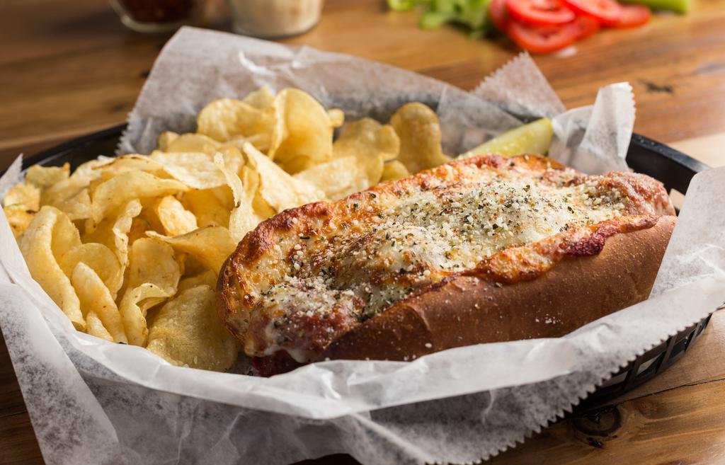 Meatball Sub · Over roasted meatballs and marinara come together in a marriage of flavor on a hoagie roll (white or wheat). It's made all the better by having Provolone cheese melted over it and being dusted with basil, oregano, and Parmesan cheese. Served with choice of chips or pasta salad.